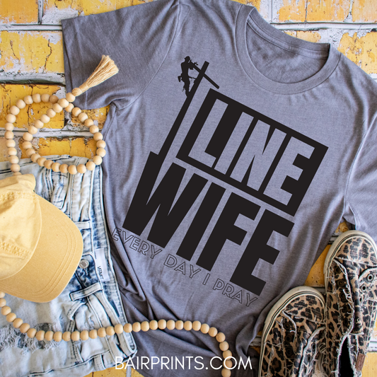 Line Wife everyday i pray t-shirt with a lineman graphic