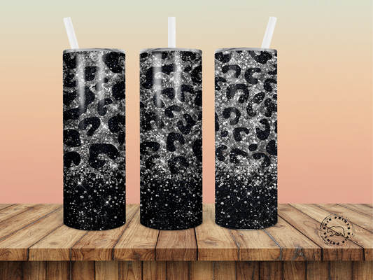 Black and silver 20oz leopard print tumbler with lid and straw.
