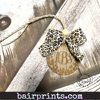 Round Leopard Wood Car Charm with Bow